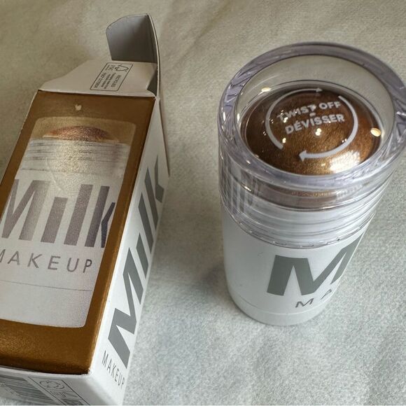 MILK MAKEUP Dewy Cream Highlighter Stick Color: Spark - golden copper - Picture 2 of 5